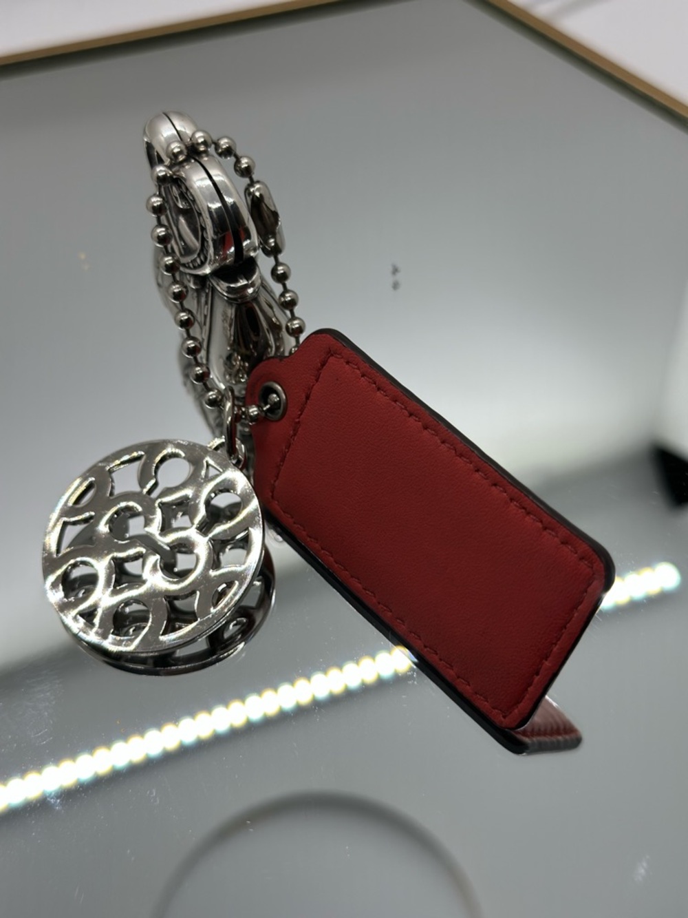 Coach Red Patent Leather Tag Keychain with Silver Medallion